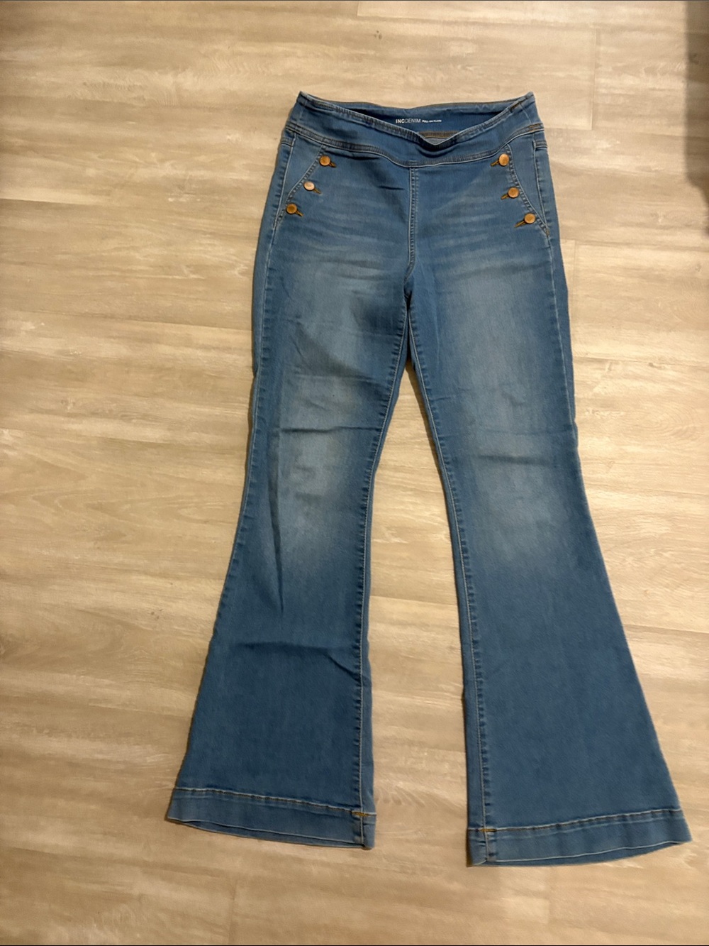 Women’s Blue Flared Jeans with Button Accent